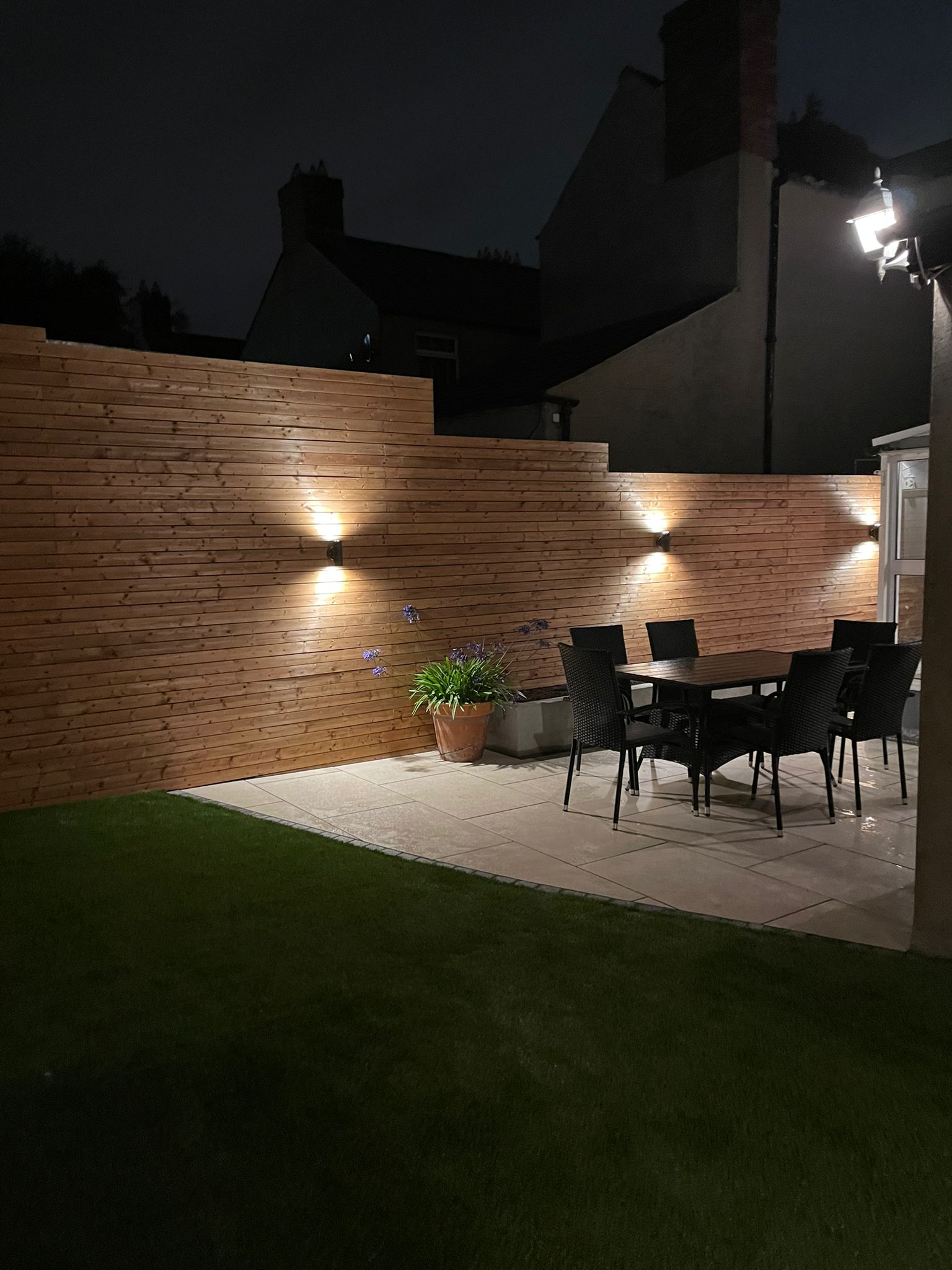 Garden design with horizontal fence and spotlights