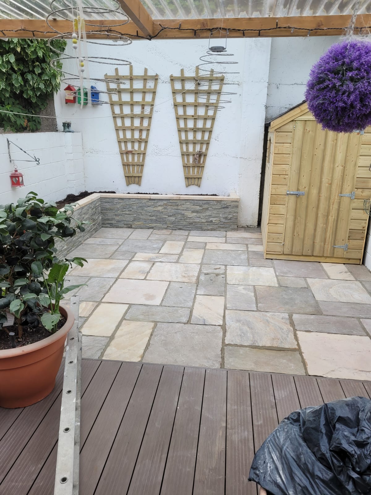 garden shed on a paved patio